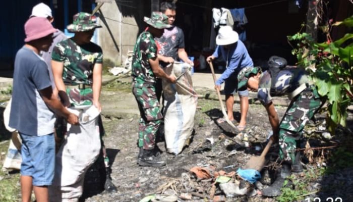 Satgas TMMD ke-121 Kodim Minahasa Bersama Masyarakat Bersihkan Area Pasar