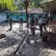 Yonif Wiratama Bersihkan Pondok Pesantren Terdampak Banjir di Manado