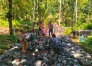 TMMD ke-124 Kodim 1301/Sangihe Fokus Penyusunan Batu Dasar untuk Jalan di Kampung Kalasuge