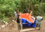 Satgas TMMD Kodim Gorontalo Inovasi Tempat Penampungan Air dari Terpal dan Mesin Penyedot Air untuk Mendukung Pembangunan Jalan Rabat Beton