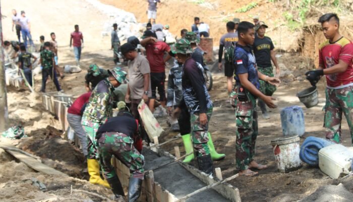 Satgas Kodim 1309/Manado Bersama Warga Genjot Pekerjaan Jelang Penutupan TMMD ke-125